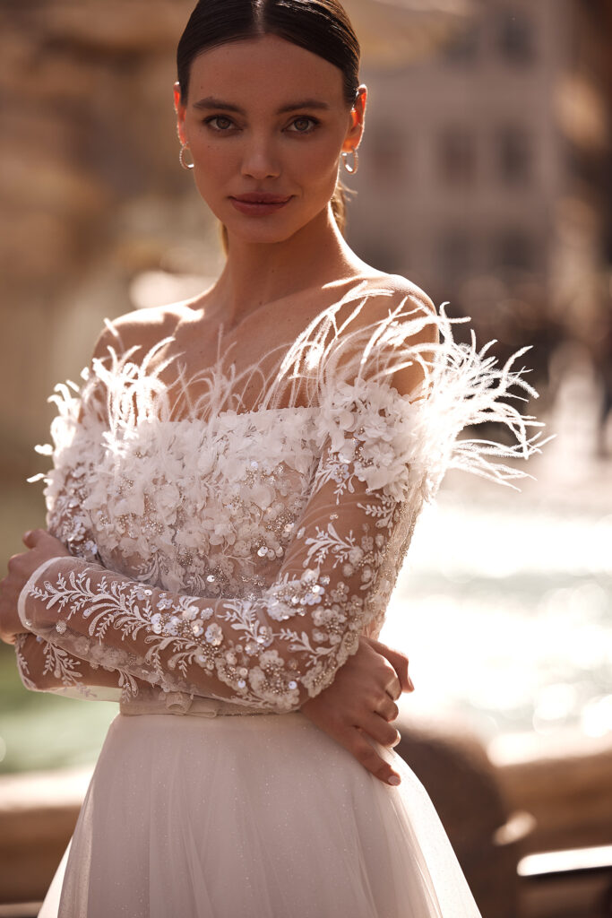 abito sposa con piume a a parma